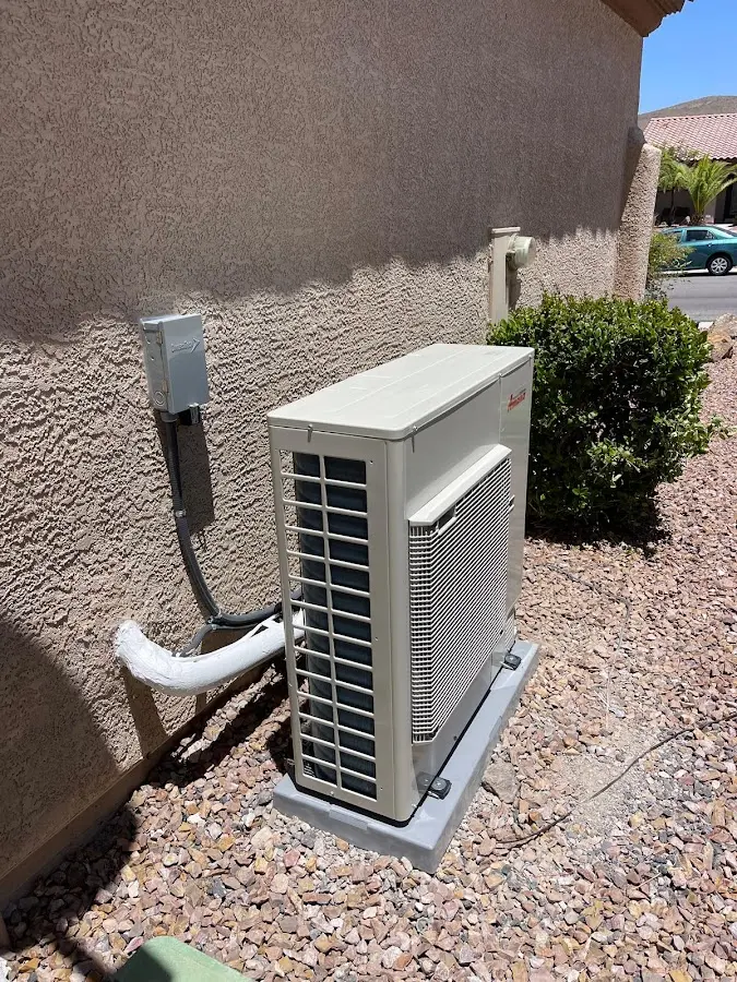 Residential air conditioning condenser unit in Tuscumbia